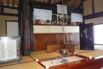 <p>Shinto ornaments and a fireplace in the hotel</p>