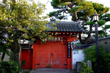 <p>Red gate of a shrine, now closed for the night</p>