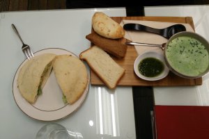 This is broccoli soup with a &quot;green pita sandwich&quot; - lettuce and an edamame (young soy bean) and potato salad