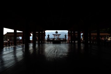 <p>Overlooking the high stage and the big torii gate from the main hall</p>