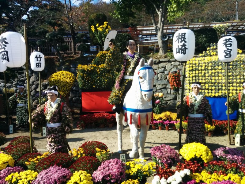 <p>One of the highlights of the festival is this scene of flower dolls and potted flowers along the water</p>