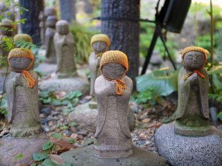 Jizo figures with orange hats