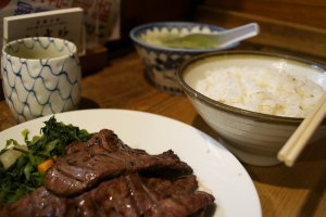 Gyutan served with barley rice, pickles and ox tail soup