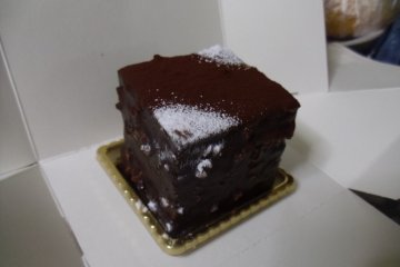<p>Aoba Castle Stone, a chocolate-y treat with layers of cake and cream</p>