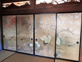 This beautiful fusuma depicts all four seasons. Also note the beautifully carved ranma above them. &nbsp;