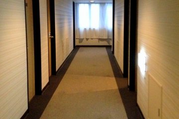 The hallway leading to the rooms