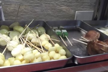 <p>More skewers waiting to be fried</p>