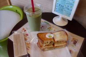 A Japanese mustard spinach and banana smoothie with a burdock root and cheese sandwich, a lunch set