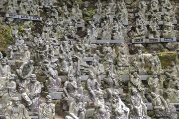 A massive array of individual Buddhist characters, each with incredibly unique detail.