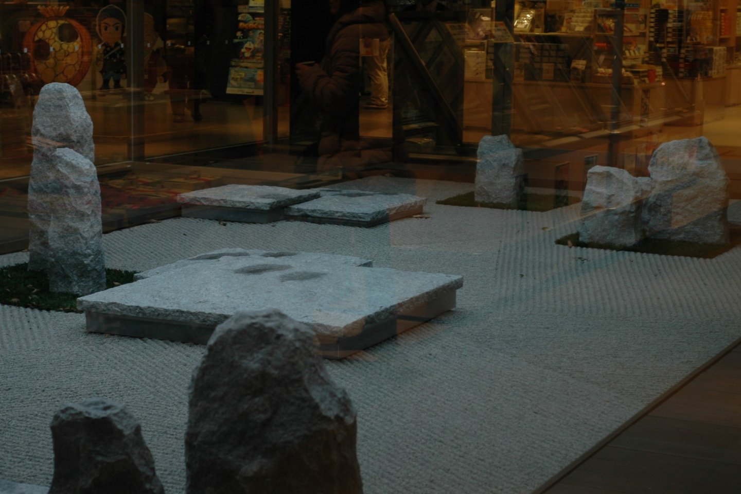 A zen garden in the middle of the Tomobe Service Area shopping area. 