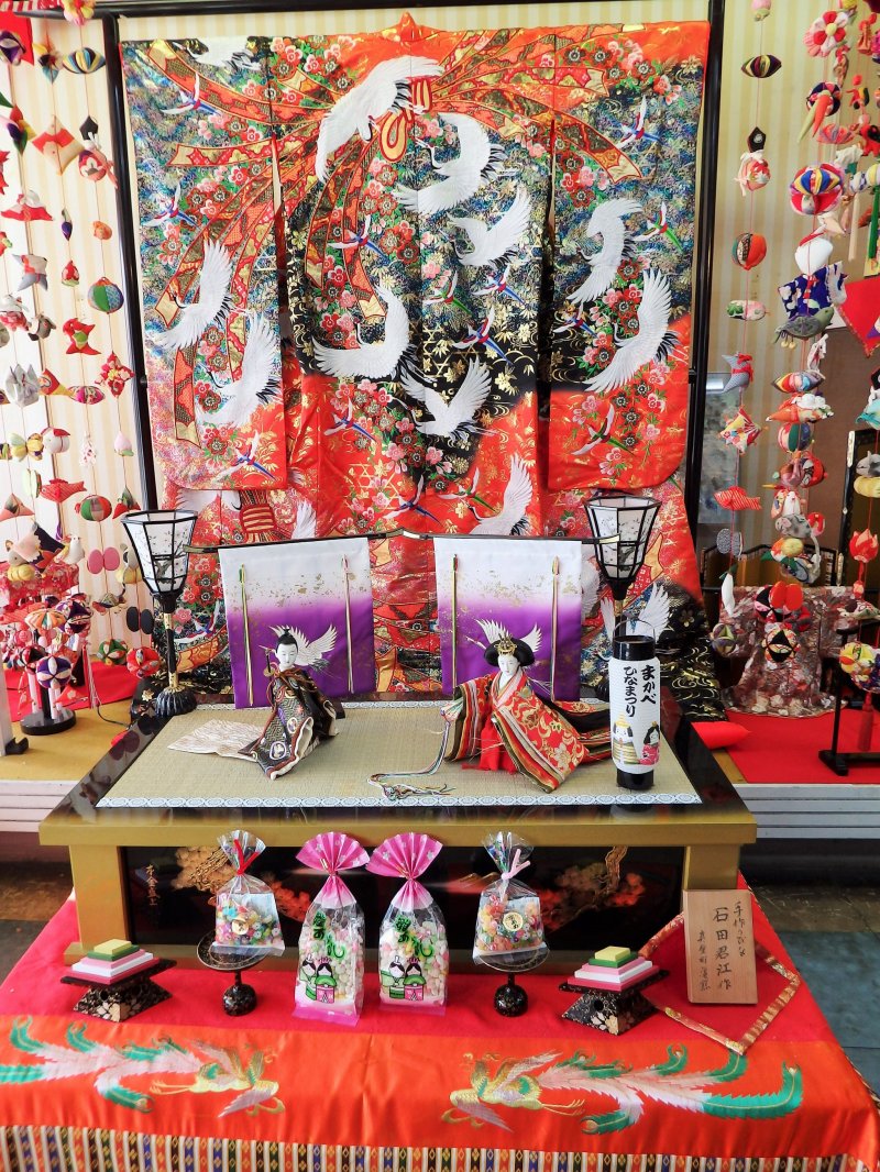 <p>This beautiful kimono adds an unusual backdrop to a pair of traditional hina dolls.</p>