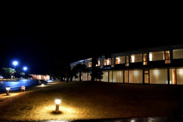 <p>Illuminated hotel buildings at night</p>