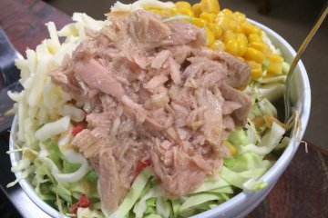 <p>Staff will bring you a bowl that comes with all ingredients and liquid dough. This is the &quot;Tuna Corn Cheese Monja&quot;.</p>