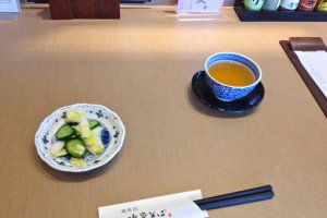 Salt pickled cabbage and cucumber (tsukemono) and tea