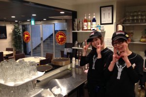 Friendly staff working behind the counter