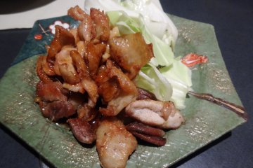 <p>Yakitori chicken, cooked Imabari style between two paddles</p>