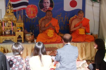 <p>Monks leading prayer at the Thai Festival</p>