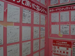 Corridor leading up to an &quot;adult&quot; store featuring some actresses&#39; autographs