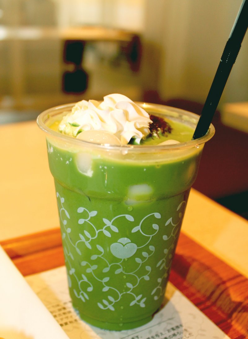<p>The cold matcha latte, with whipped cream, azuki bean paste, and rice balls</p>