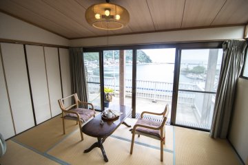 <p>Did I mention the balcony? Right. You can lap up the sea breeze from outside, or enjoy the view from the warm interiors of the ryokan room.</p>