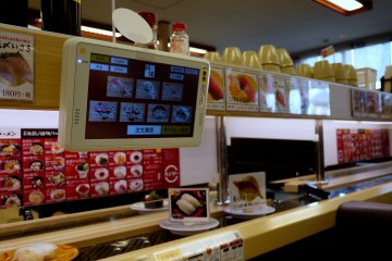<p>Order the kind of sushi you want from the touch screen</p>
