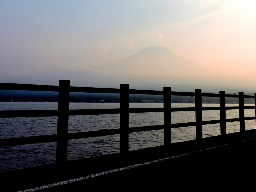 As evening fell Mount Fuji slowly appeared from the haze