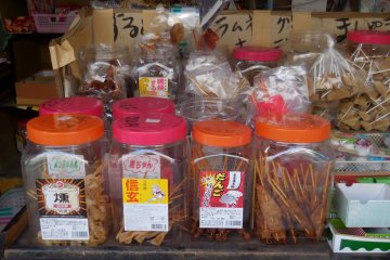 <p>Marinated dried cutlle fishes in a jar</p>