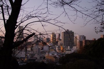 View of the Minato Mirai area from the cemetery at sunset.