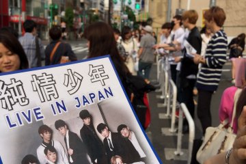 <p>Don&#39;t forget to grab a flier from a K-Pop band.</p>