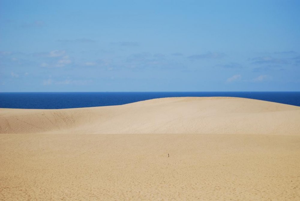 Where sky, ocean and dunes