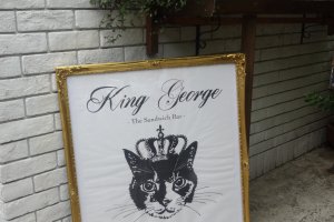 Look for the sign of the crowned cat to show you the way