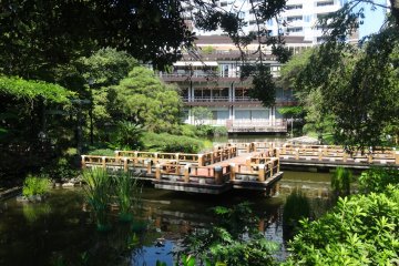 <p>An event hall and cafe stands at the garden&#39;s edge</p>
