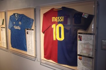 <p>Shirts of Diego Maradona and Lionel Messi</p>