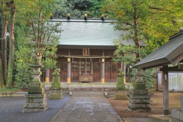 Rokusho Jinja is framed with two stone dogs