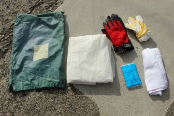 <p>The rental fee includes all these things: a towel, rain poncho and cold weather gloves (for just in case), work gloves, tissues and a lock for the scooter (not pictured). The scooters are always tanked up and you don&#39;t have to worry about refilling it</p>