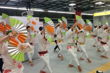 <p>Riders were greeted by dozens of suzume-odori dancers as one of the many special performances during the subway ride</p>