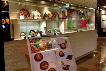 <p>The restaurant&#39;s exterior showcases sample Korean dishes</p>
