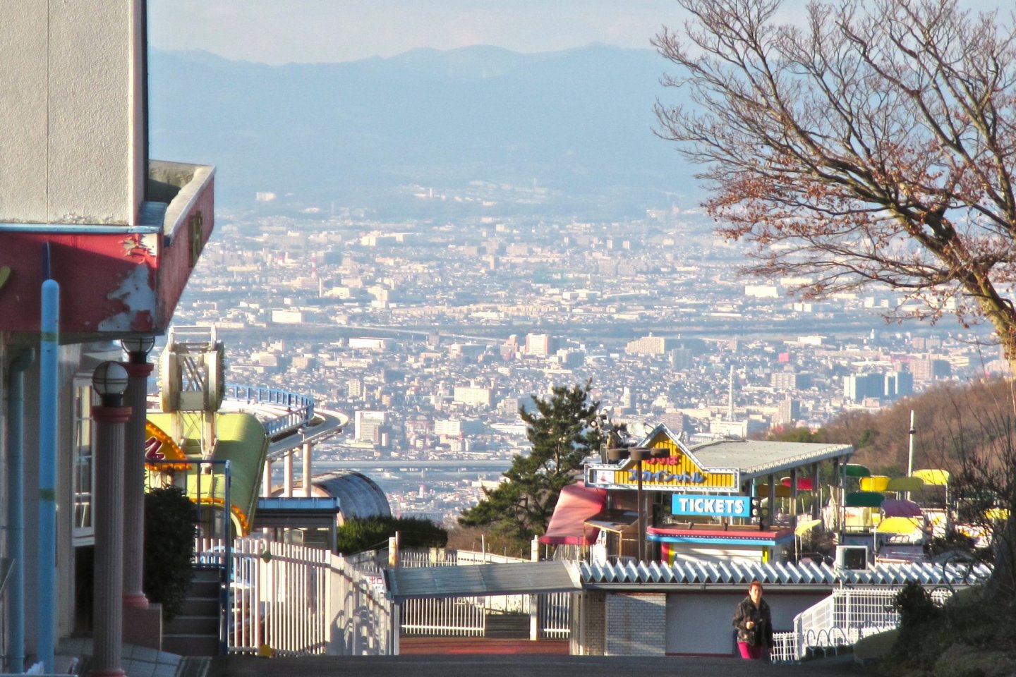 The amusement park and the view of Osaka from inside one of the walkways