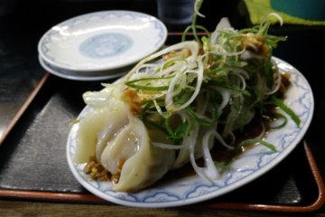 <p>Giant dumplings in tasty sauce</p>
