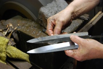 Knives at different stages of polishing
