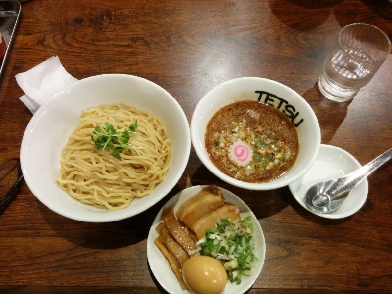 A tsukemen set with boiled egg and sliced pork