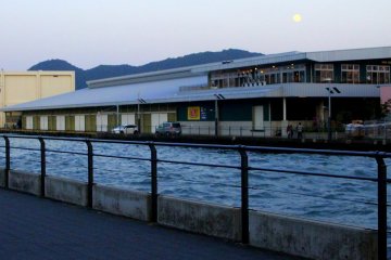 The early evening moon above Numazu Port
