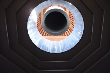 Looking up to the bell at the top of the columbarium