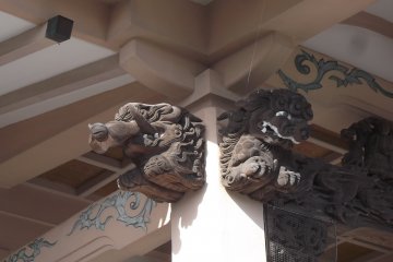 A boar (I think) and a lion under the eaves