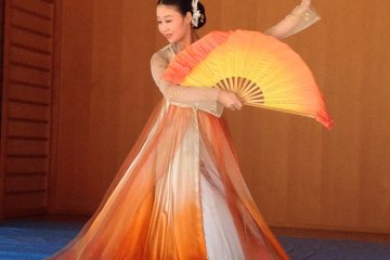 Graceful flowing robes in a Korean inspired dance