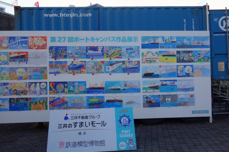 A display of artwork by children depicting their idea of what Yokohama Port is all about