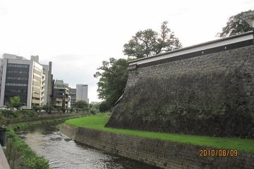 The outermost wall and moat of the castle
