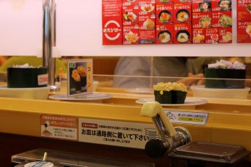 <p>Sushi dishes are served via the rolling conveyor belt.</p>
