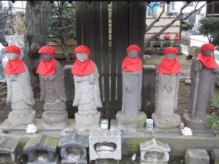 A line of statues by the path