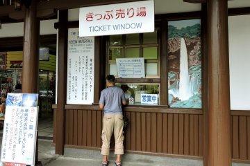 Buying a ticket for the elevator to the viewing platform